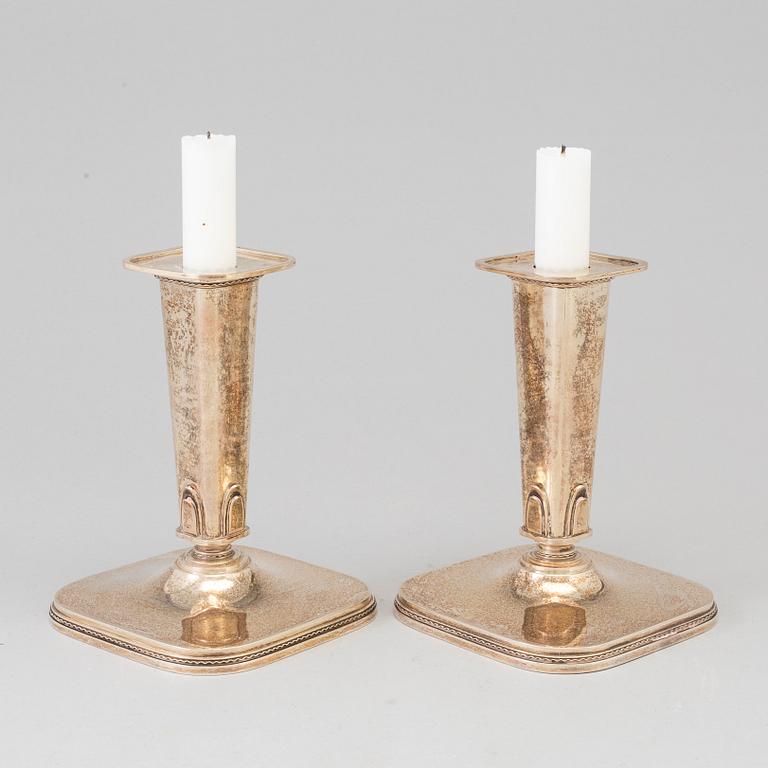 A pair of steling silver candlesticks by Atelier Borgila, Stockholm, 1951.