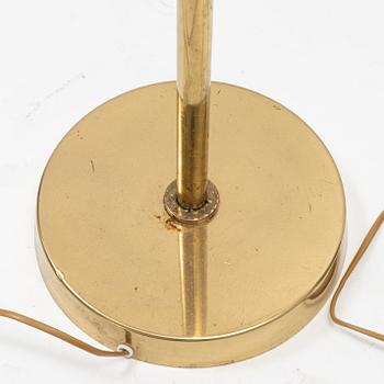 A pair of model 'G-18' brass floor lights, Bergboms, second half of the 20th Century.