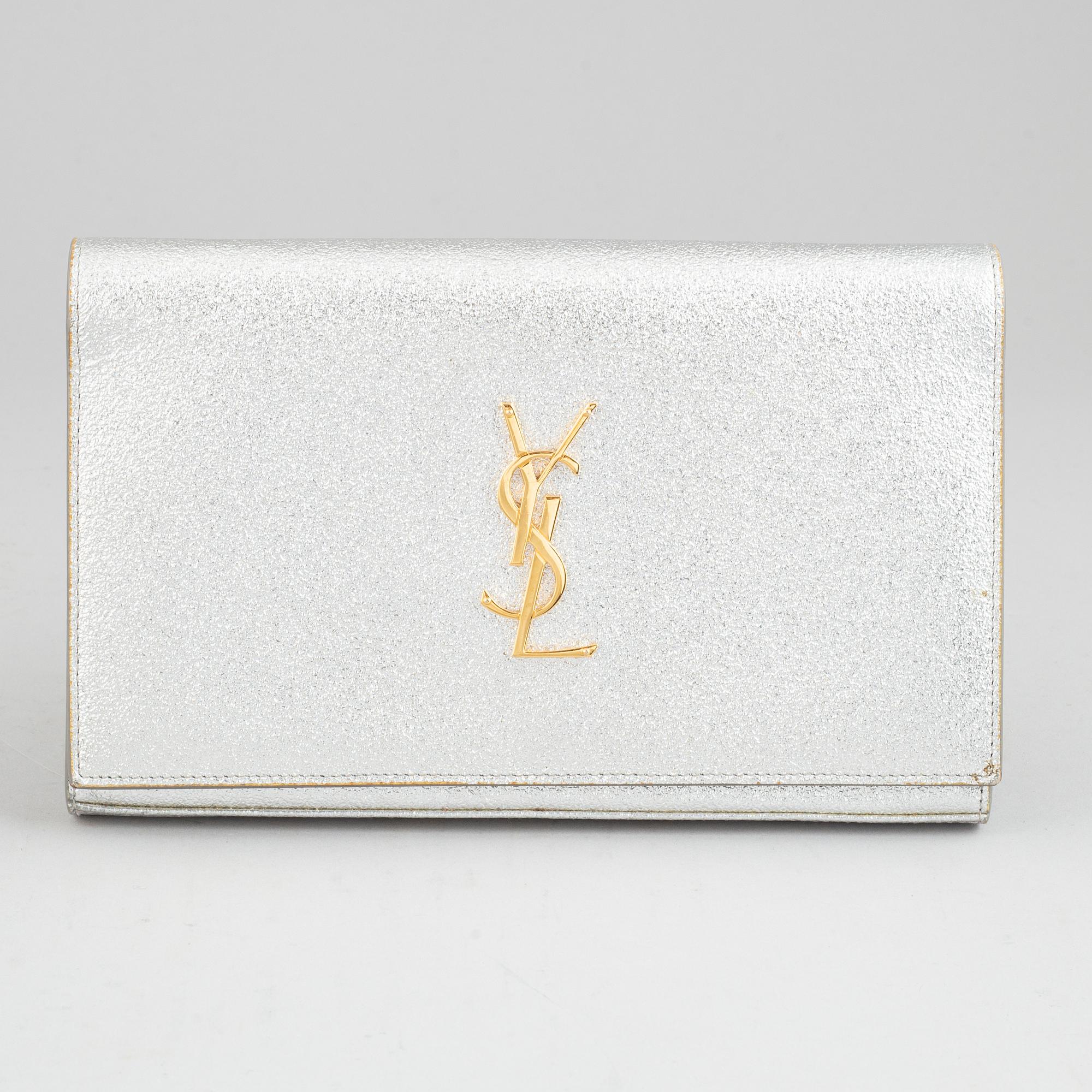 Yves Saint Laurent, a clutch.