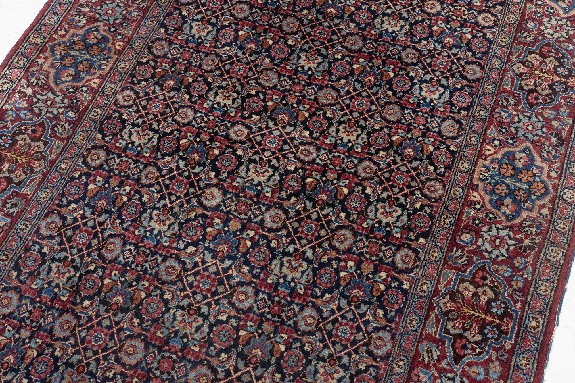 A rug, probably Meshed, semi-antique, c. 180 x 125 cm.