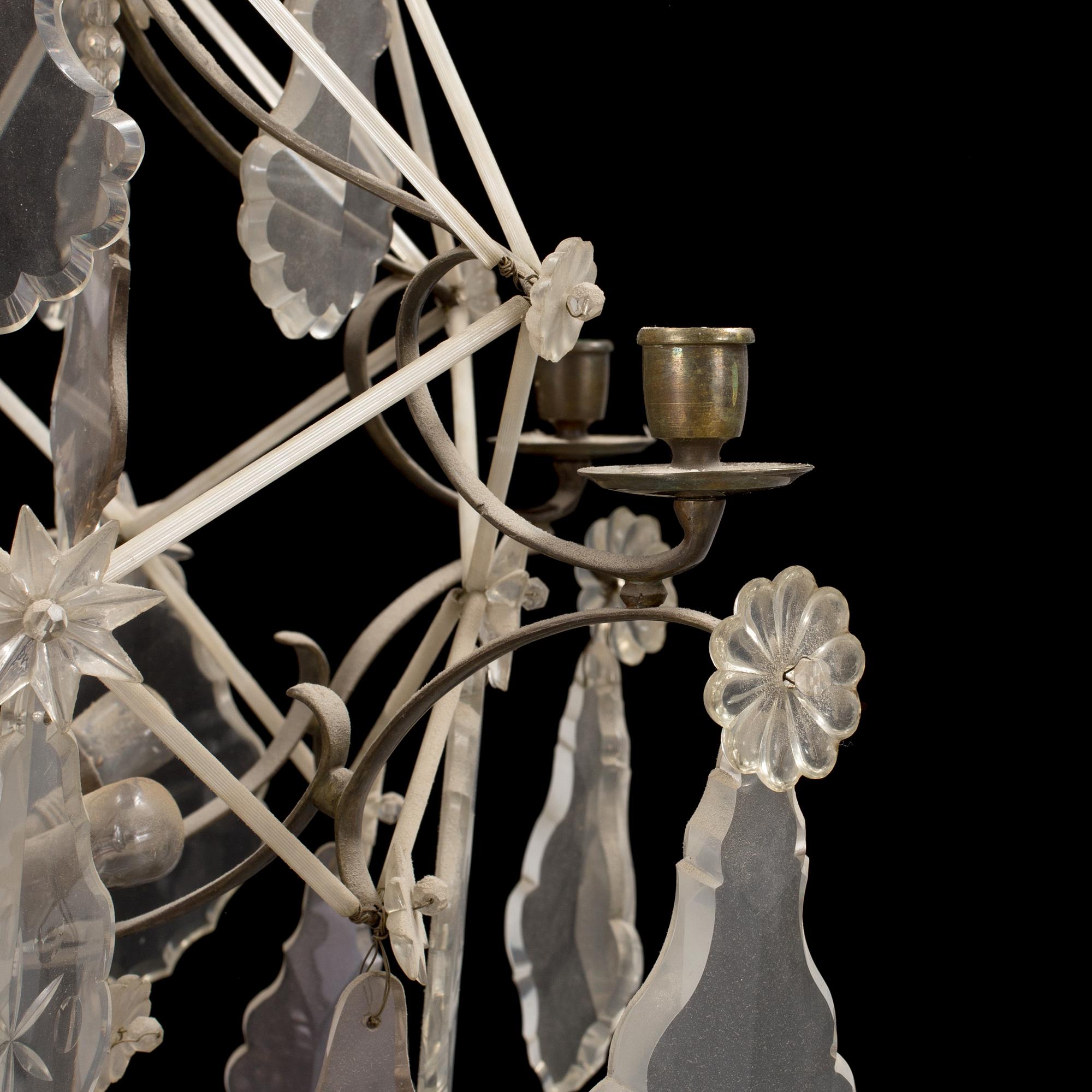 a rococo-style chandelier from the first half of the 20th century.