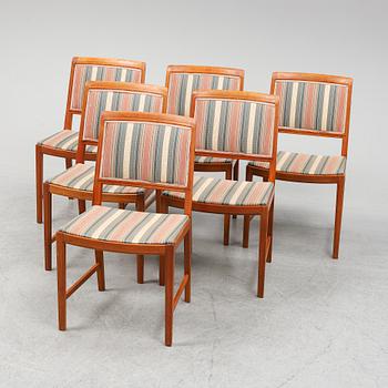 BERTIL FRIDHAGEN, a seven  piece walnut dining suite from Bodafors.