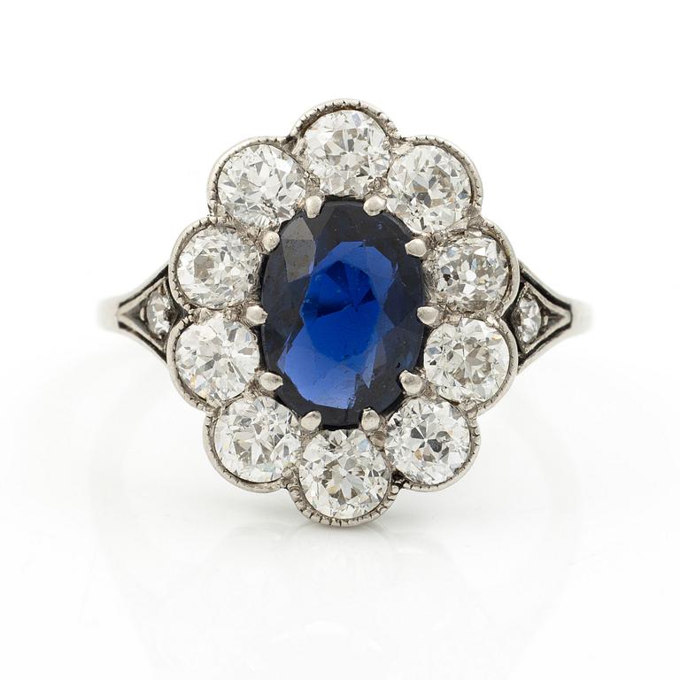 Carmose ring in platinum with sapphire and old-cut diamonds.