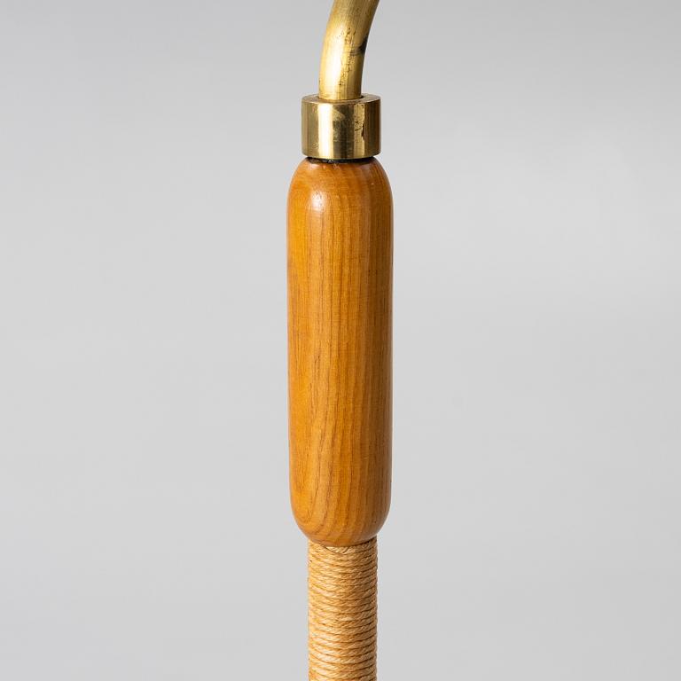 A 1940s Swedish Modern floor lamp.