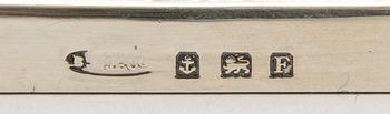 A pair of classical column sterling silver candlesticks Birmingham, 1934, by 'B.G. & Co'.