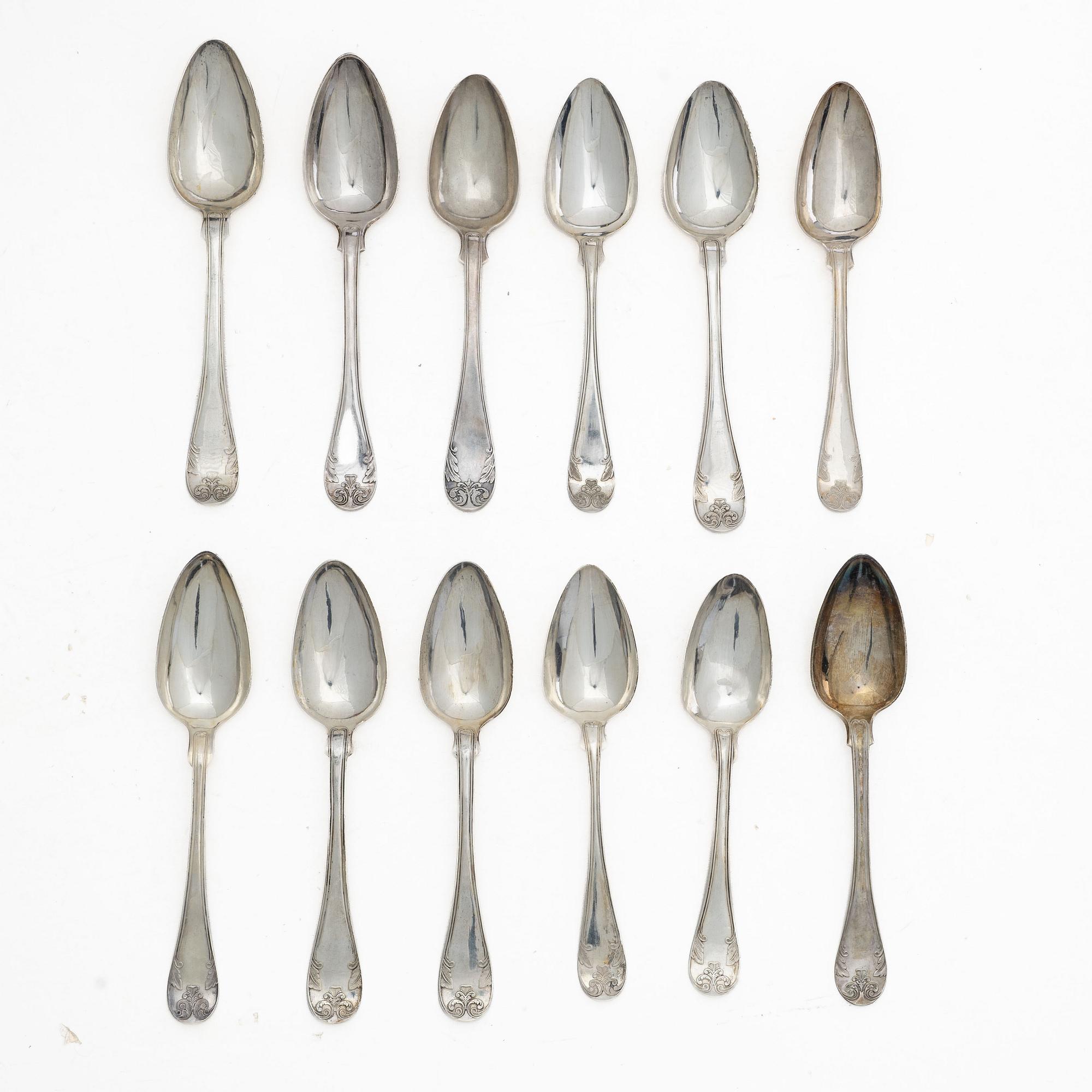 Tablespoons, 12 similar, silver, “French Lily”/“Old French”, 19th century, including Bror Erik Skogsborg, Eskilstuna, 1859.