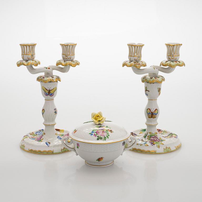 A pair of Herend porcelain candlesticks, and a lidded sugar bowl, Hungary.