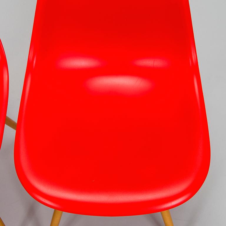 Charles & Ray Eames, two 'Plastic Chair DSW' chairs, Vitra.