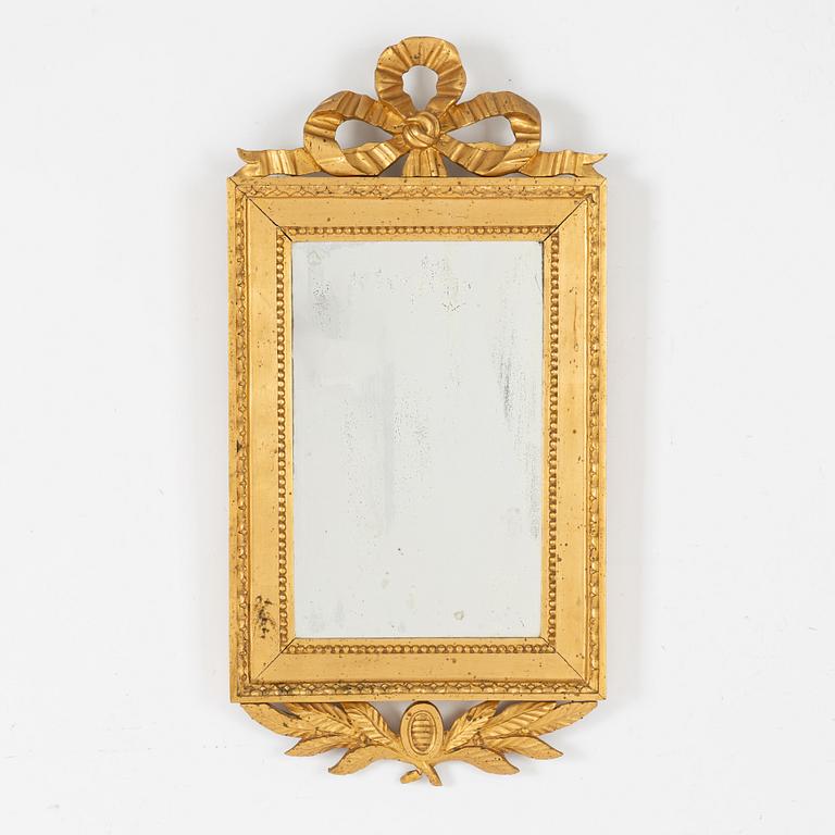 A Gustavian style mirror, first half of the 20th Century.