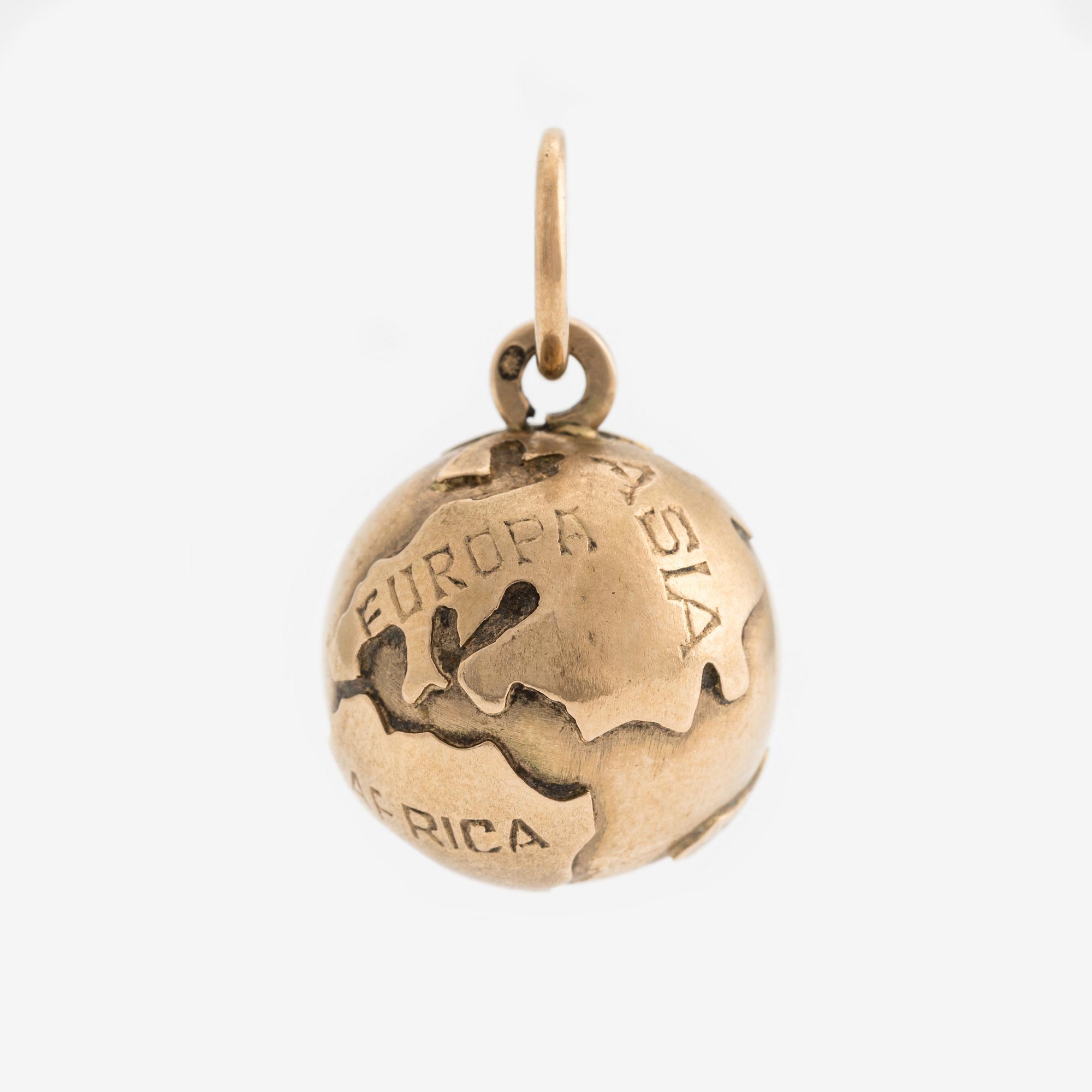 Charm in the shape of a globe, 18K gold.
