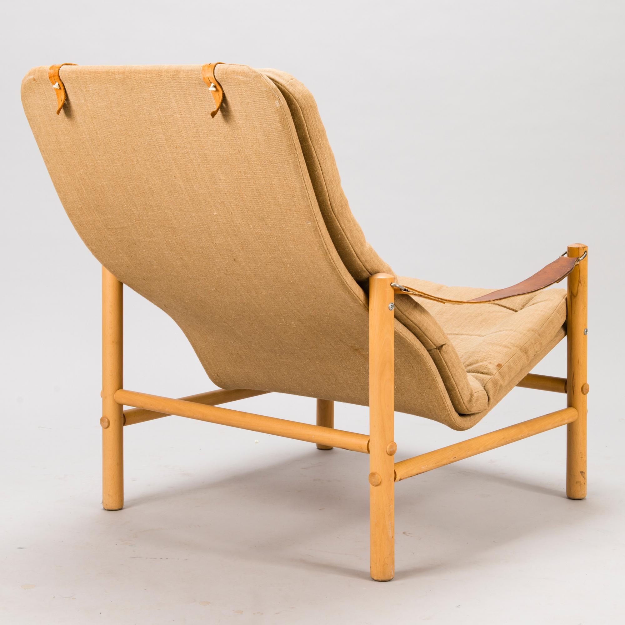 BROR BOIJE, A pair of 'Junker' easy chairs and an ottoman for Dux, Sweden, latter half of the 20th Century.