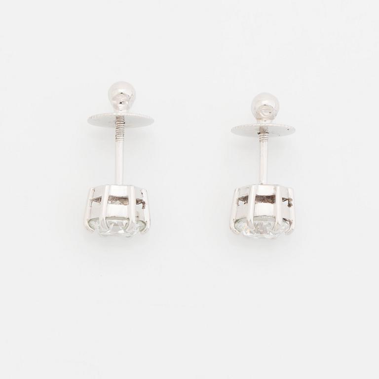 A pair of platinum earrings set with round brilliant-cut diamonds total weight 2.00 cts D if (internally flawless).