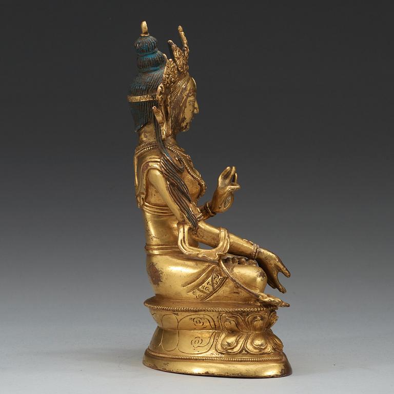 A Sinotibetan gilt bronze figure of Tara, Qing dynasty.