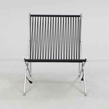 A "PK-4" chair by Poul Kjaerholm, Denmark.