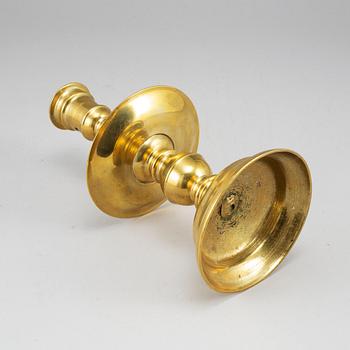 A bronze candlestick, 16th/17th century.