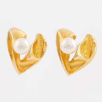 A pair of Lapponia 18K gold earrings set with pearls.