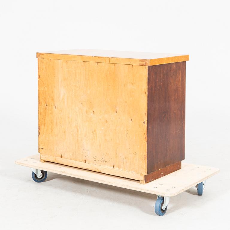 A 1940s Art Deco birch dresser.