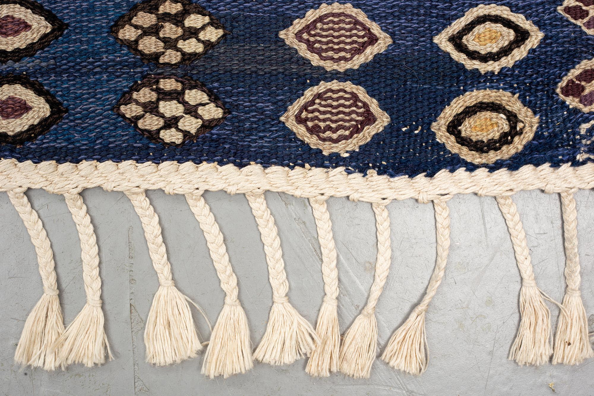 Barbro Nilsson, a carpet, "Snäckorna", flat weave, ca 312-313,5 x 200-204,5 cm, signed AB MMF BN.