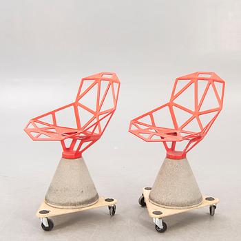 A set of two Konstantin Grcic concrete "Chair One B" chairs for Magis, Italy, 2000s.