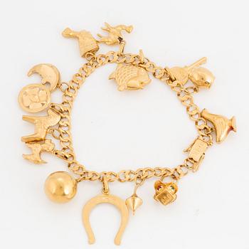 18K gold charm bracelet.