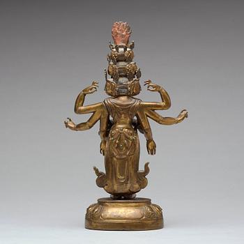 A Tibeto-Chinese gilt bronze figure of eleven-headed Avalokiteshvara, 19th Century.