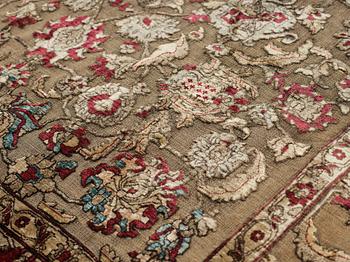 A carpet, an antique silk metal brocaded Kashan, probably around 1910, ca 200-202,5 x 129-131 cm.