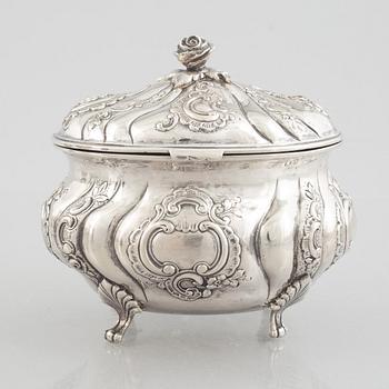 A Rococo-style silver coffee pot, creamer and sugar bowl, 20th Century.