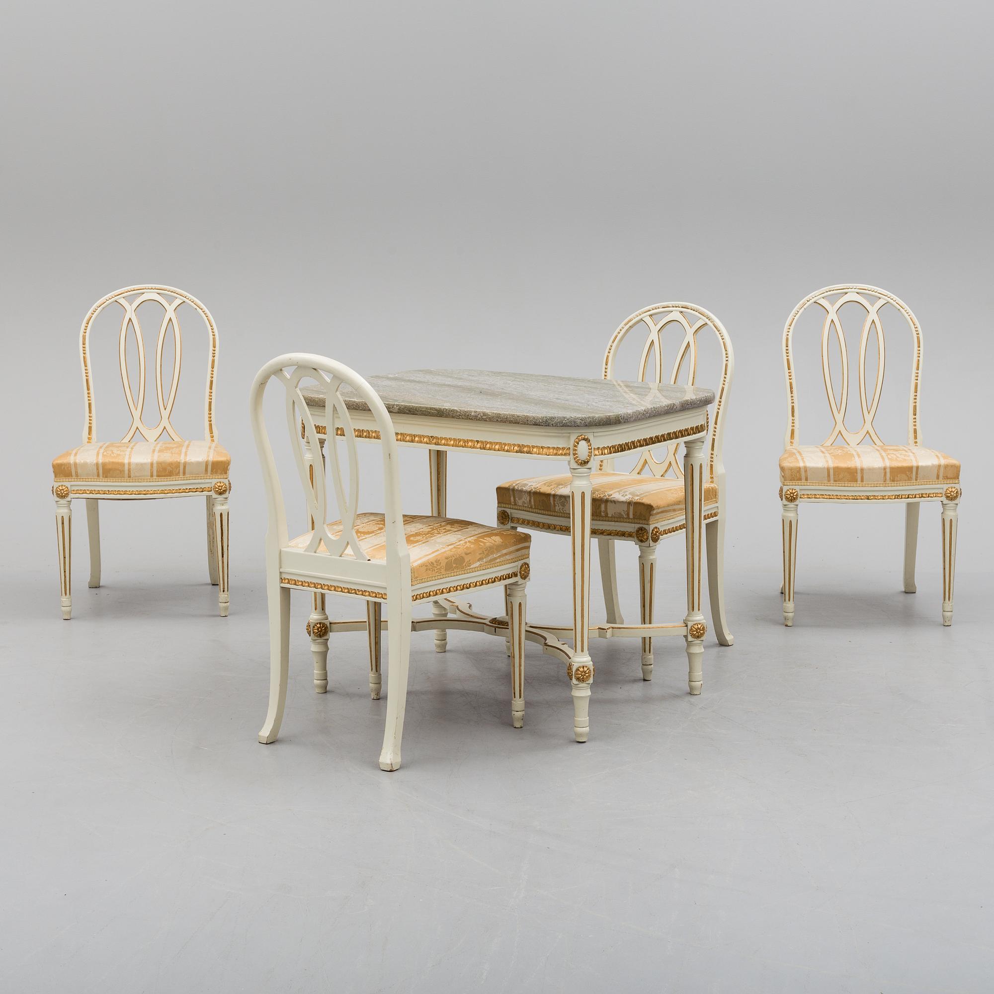 A first half of the 20th century Gustavian style five pcs furniture suite.