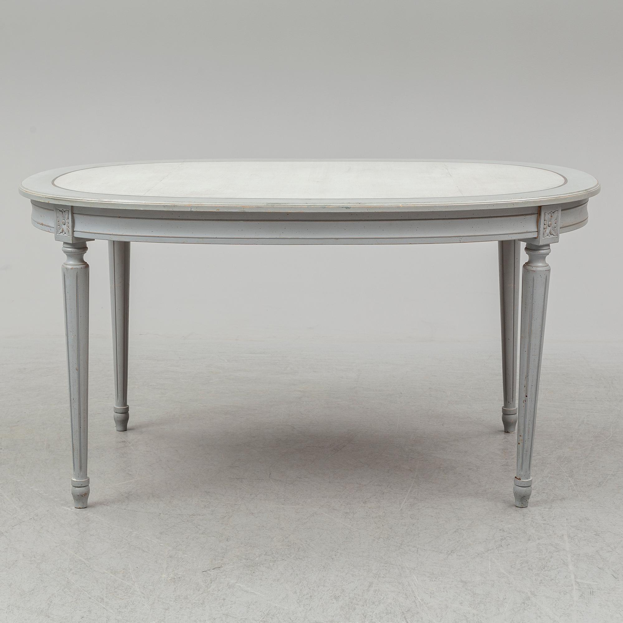 A dining table and four chairs, gustavian style, late 20th century.