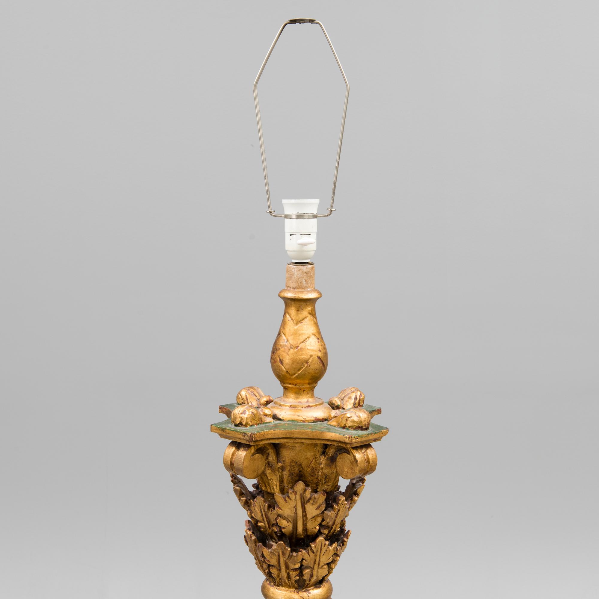 A Baroque style 1920s standard lamp.
