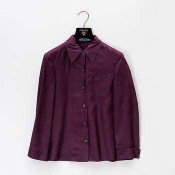 Prada, a burgundy silk blouse, size 36.