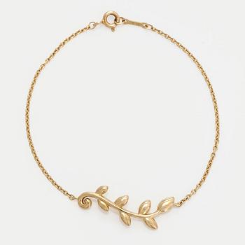 Tiffany & Co, Paloma Picasso, an 18K gold "Olive Leaf" bracelet.