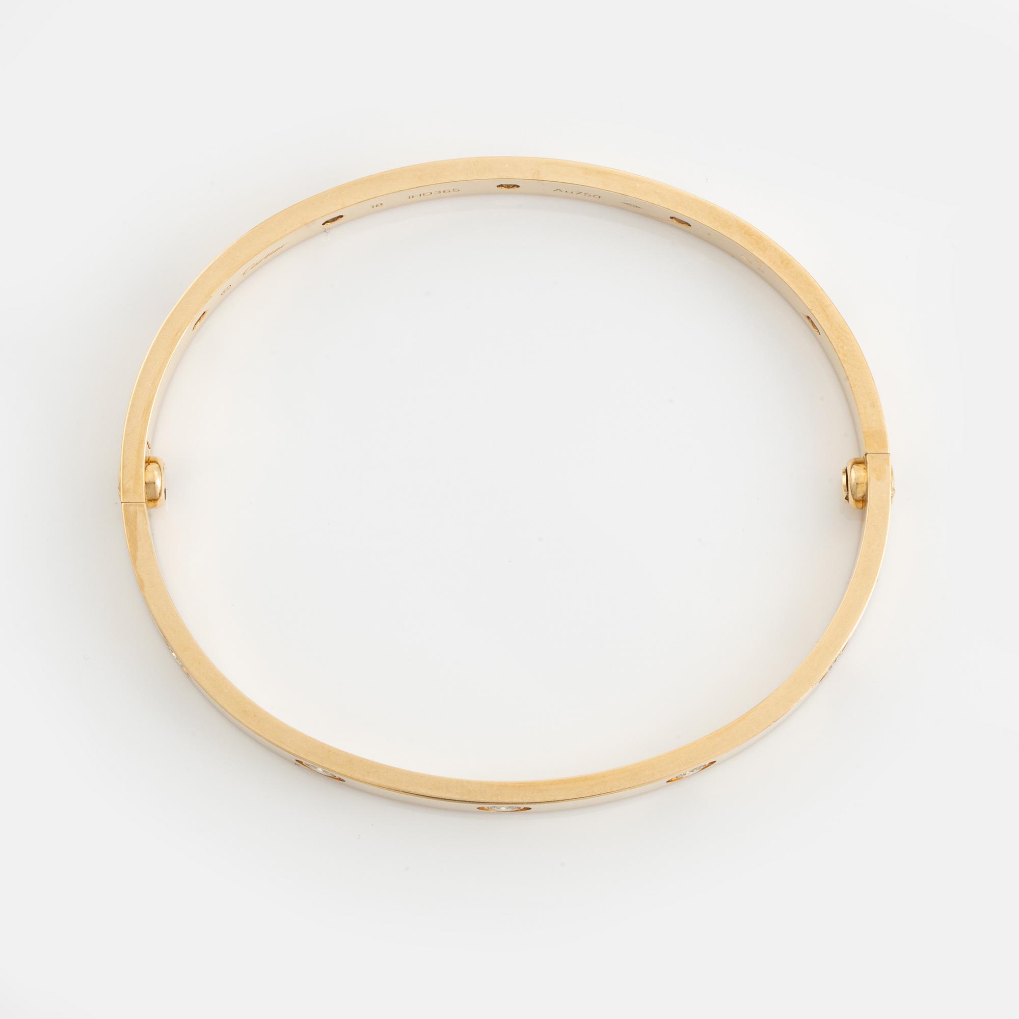 Cartier "Love" armband 18K guld med tio runda briljantslipade diamanter.
