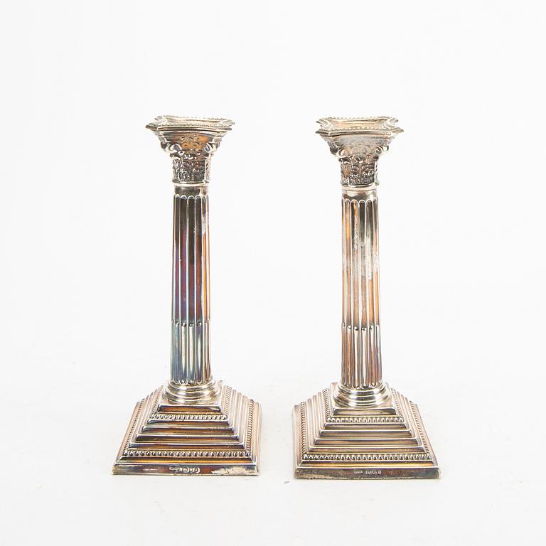 A pair of 20th century English silver candle sticks London 1965.