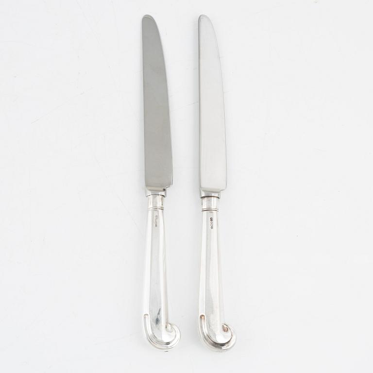 A set of English Silver Pistol Grip Knives, mark of Strickett & Loder, Sheffield 1987 (12 pieces).