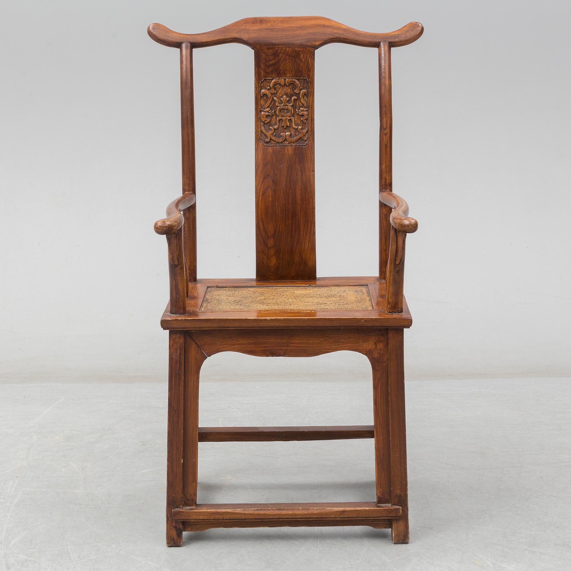 A Chinese wooden armchair, 20th century.