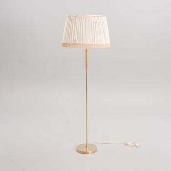 PAAVO TYNELL, A FLOOR LAMP. Manufactured by Idman.