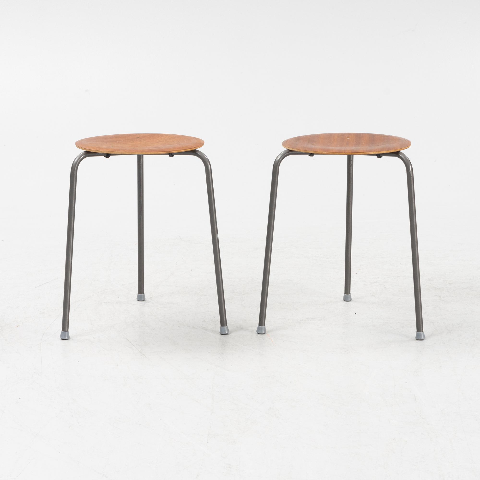 A set of five teak veneered stools, second half of the 20th Century.