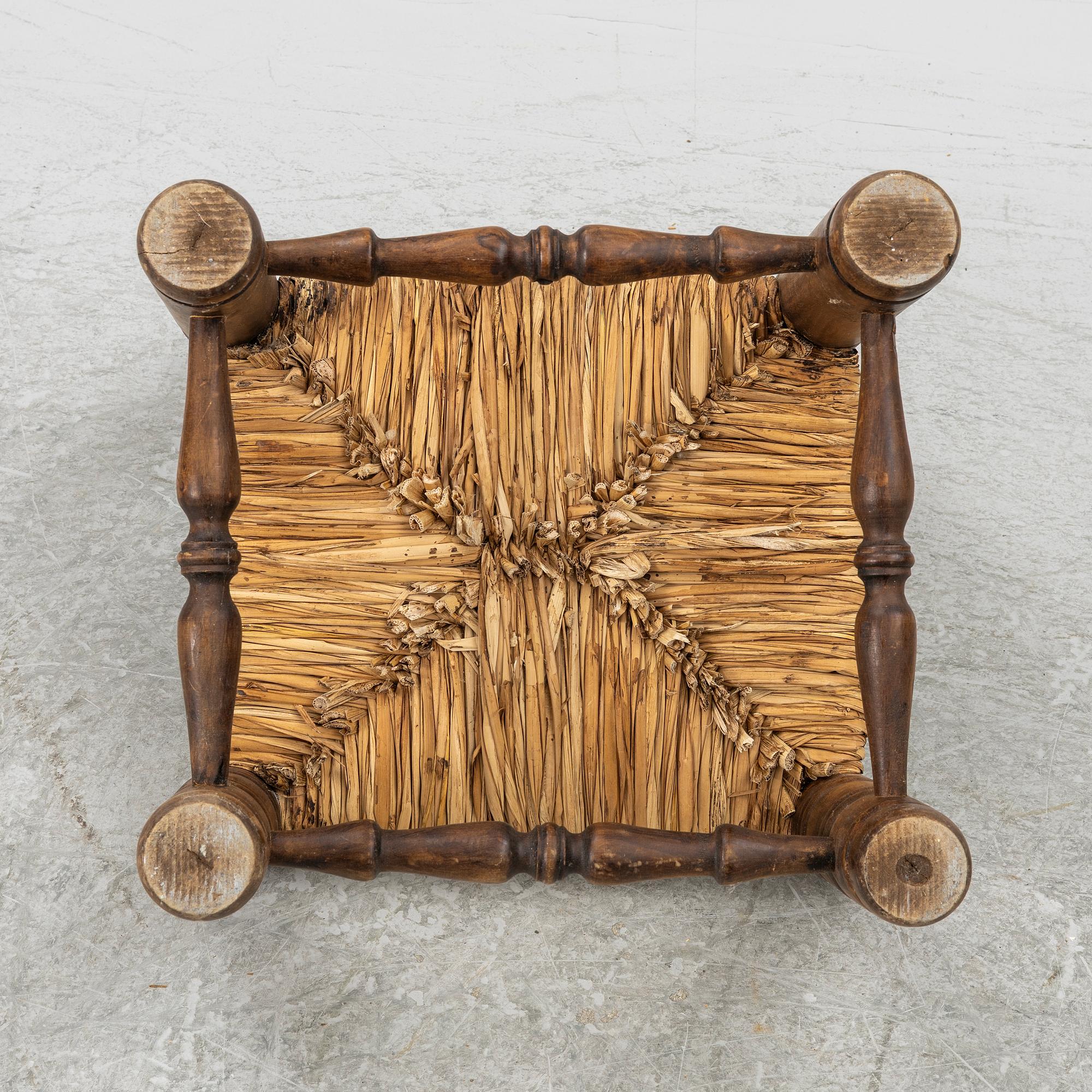 Charles Dudouyt, attributed to, a fireside low chair, mid 20th century.