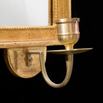 A pair of Swedish mid 20th century Gustavian style wall sconces from Kurt Ekvall in Nyköping.