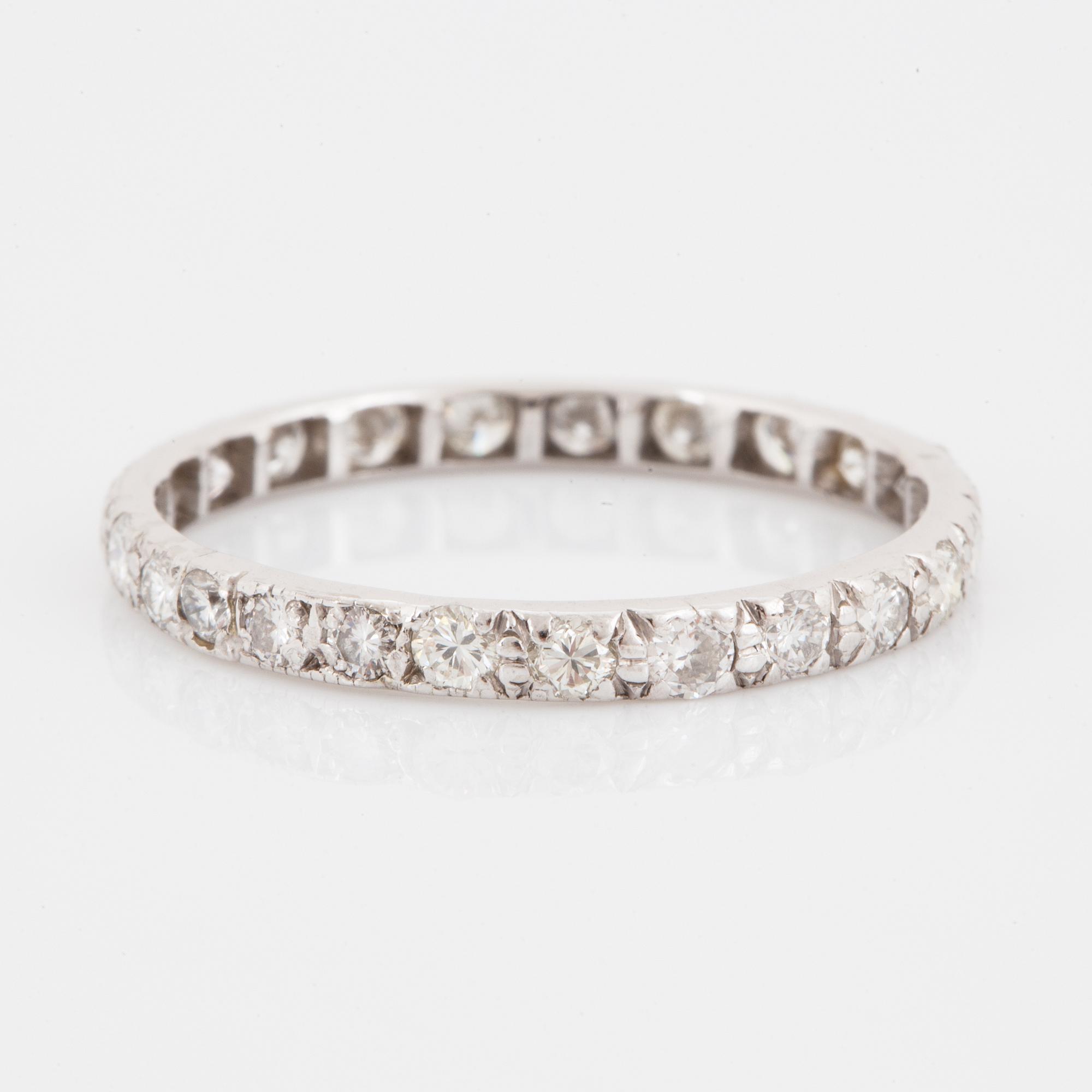 White gold brilliant-cut diamond eternity ring.