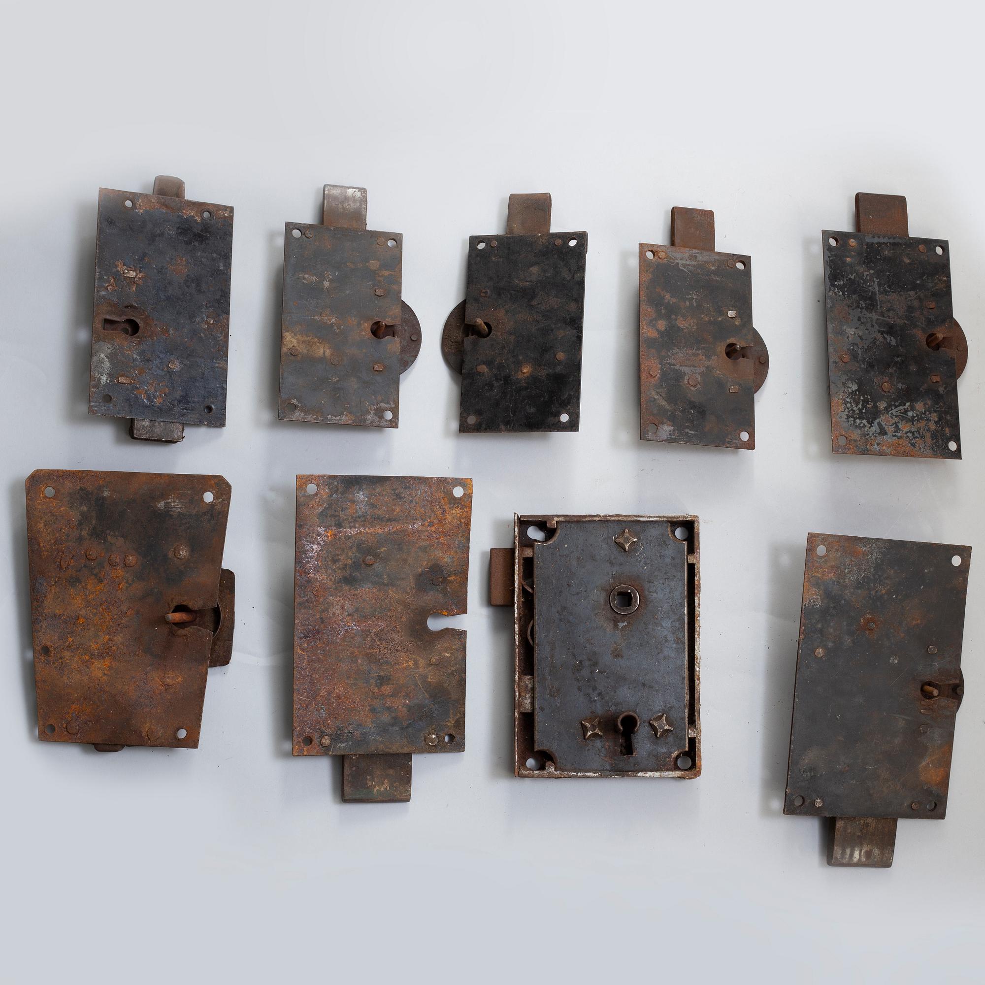 A set of nine cast iron locks, 19th century.