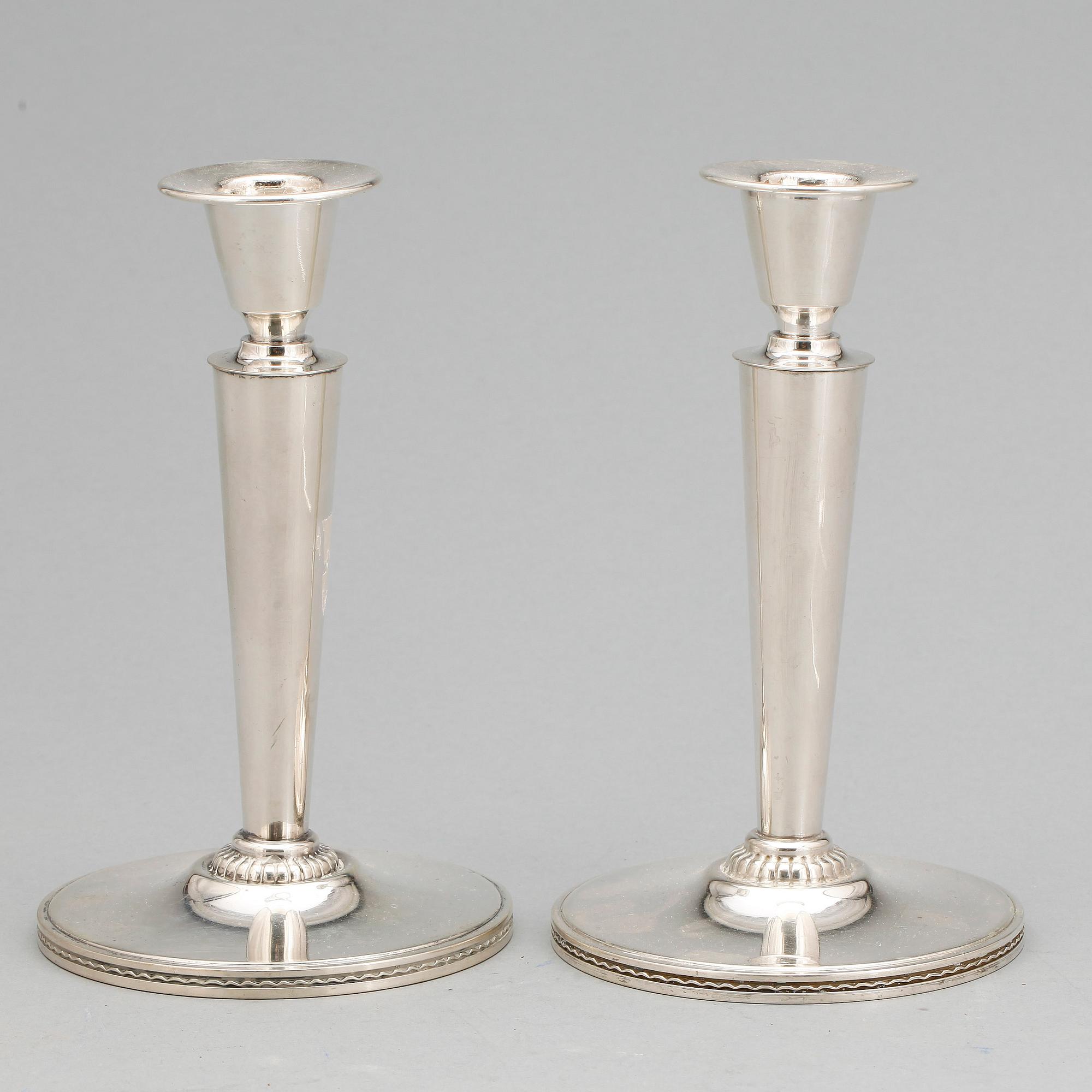 LJUSSTAKAR, ett par. Silver. CG Råström, Stockholm 1959. Vikt ca 420 g tot.