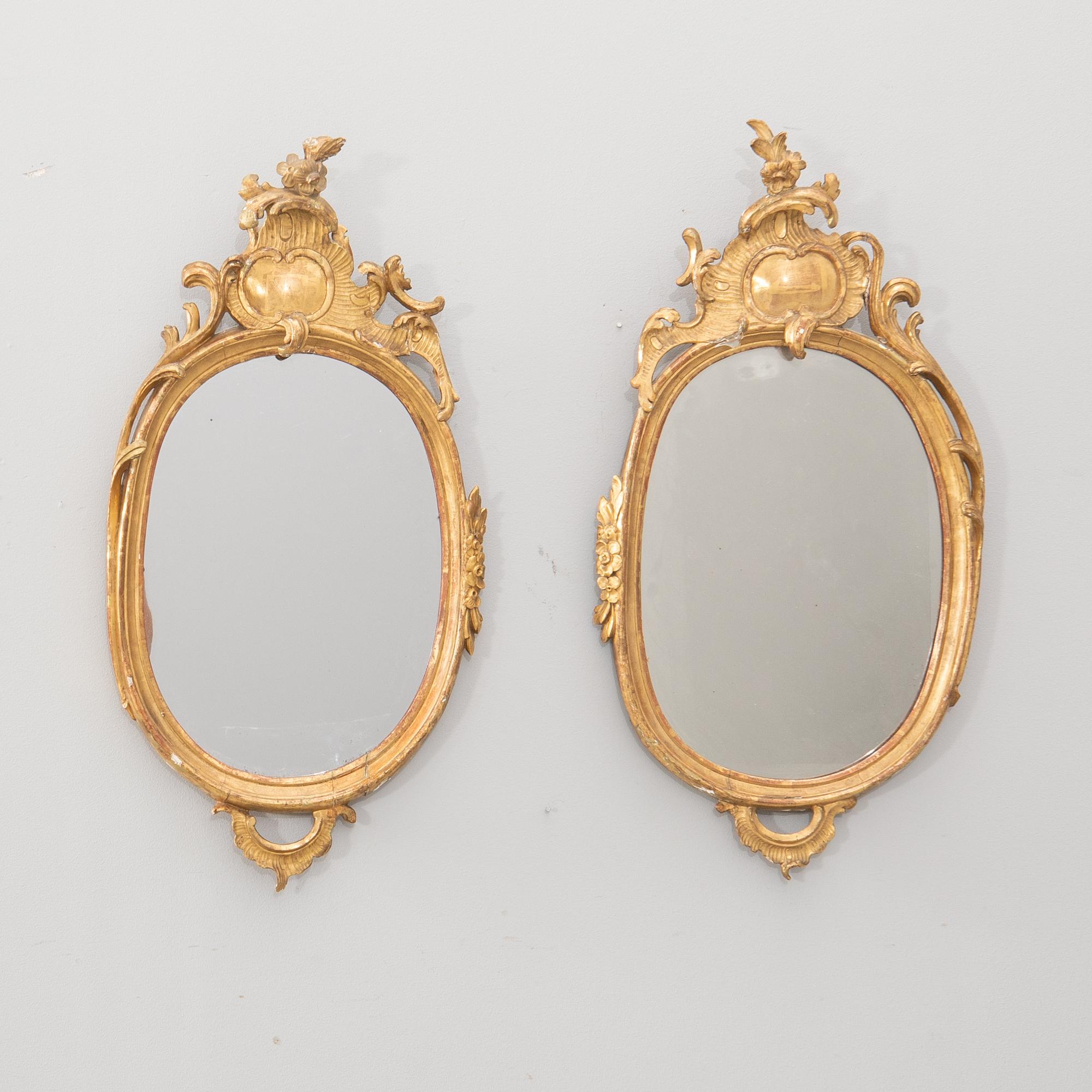 Mirrors, a pair in the Rococo style, circa 1900.