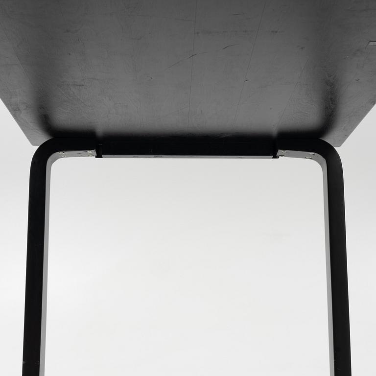 Alvar Aalto, a dining table and eight chairs, model 69, Artek, Finland, end of the 20th century.