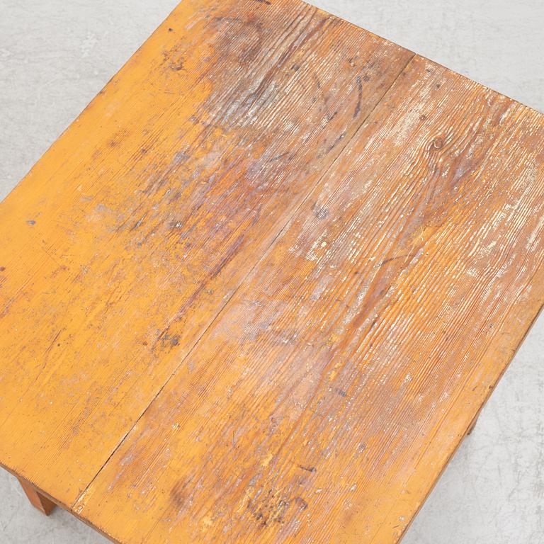 A table with drawer, 19th century.