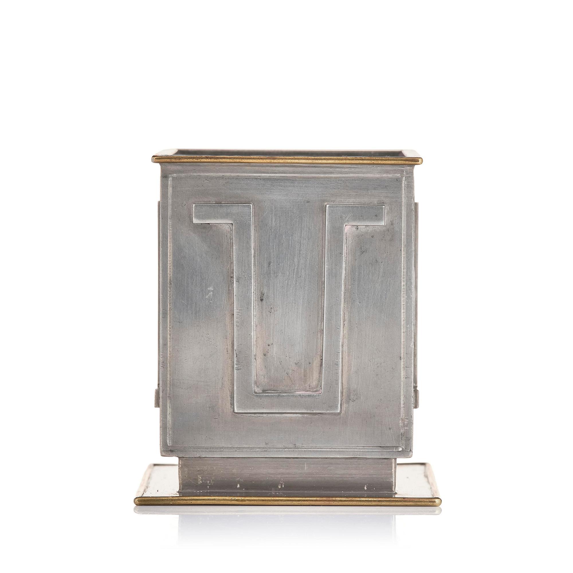 Nils Fougstedt, pennkopp, tenn och mässing, modell A 503, Firma Svenskt Tenn, Stockholm, 1932.