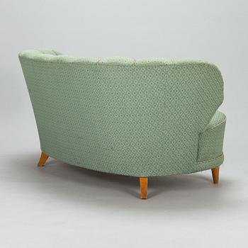 A mid-20th-century sofa.