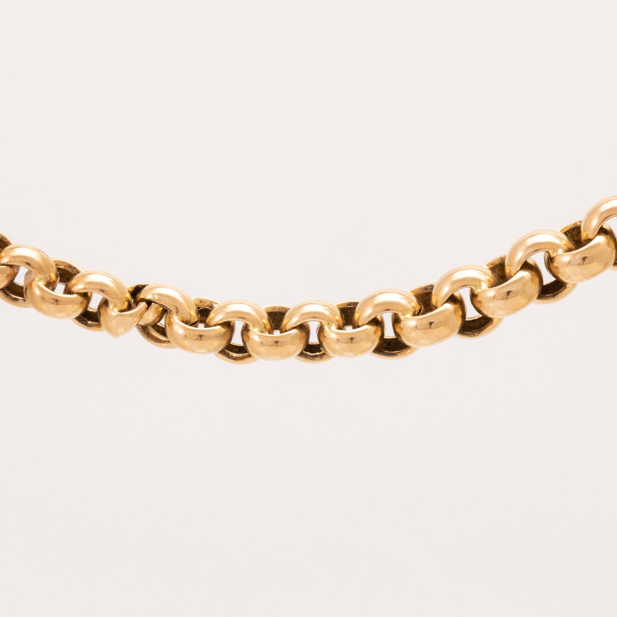 An 18K pocket watch chain.