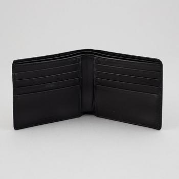 Bottega veneta, a black leather wallet.